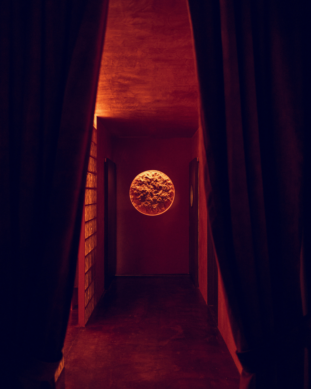Marte Hi Fi entrance with a glowing circular wall feature