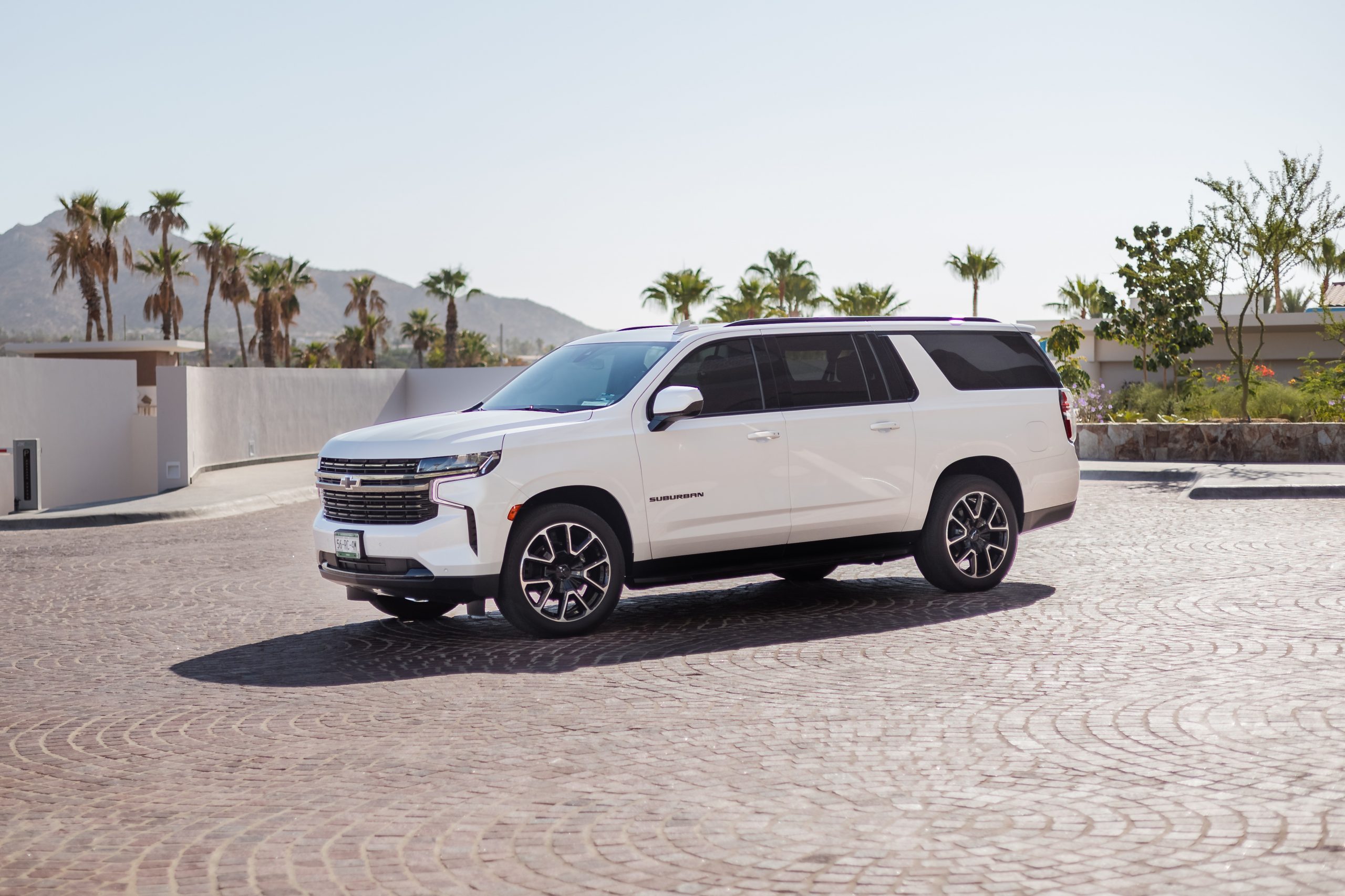 White Chevrolet SUV photographed by Cabo Seasons outside a Los Cabos resort