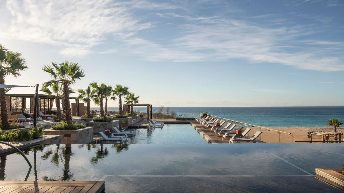 Oceanfront pool and loungers at Zadún